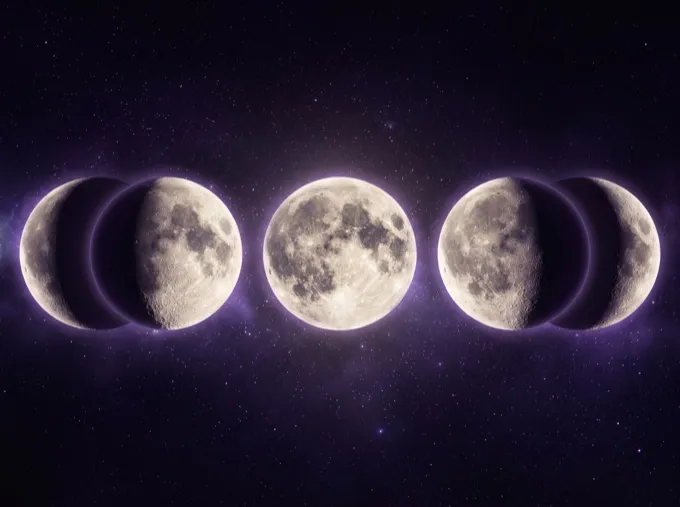 Phases of the moon across a starry sky
